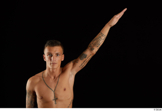 Claudio  1 arm flexing front view nude tattoo 0004.jpg